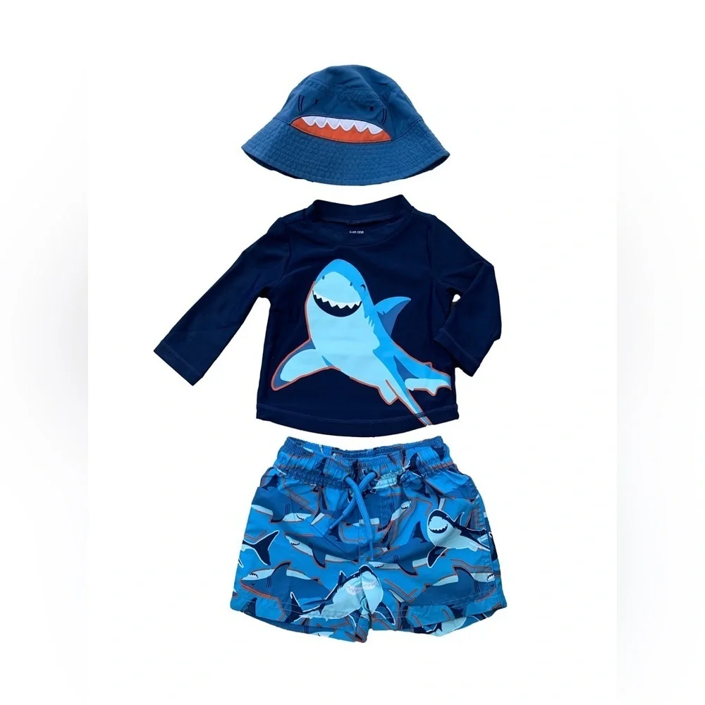 Carter’s Three Piece Swim Set with Bucket Hat, Rash Guard and Shark Swim Trunks